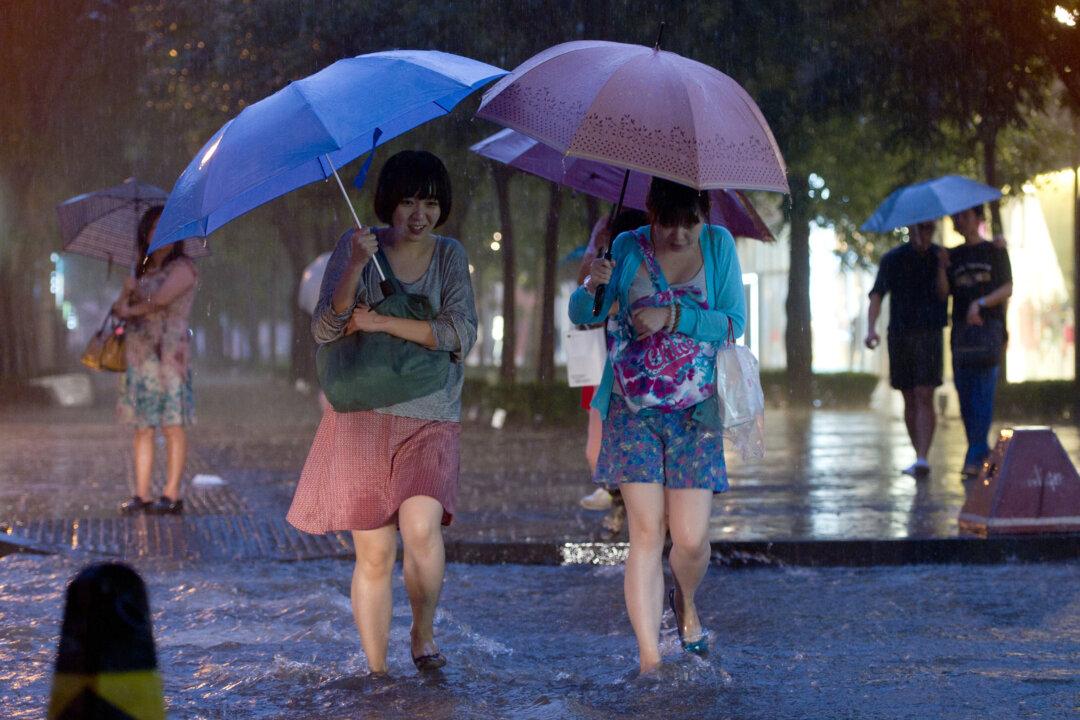 Beijing Tries Safety Nets for Manholes