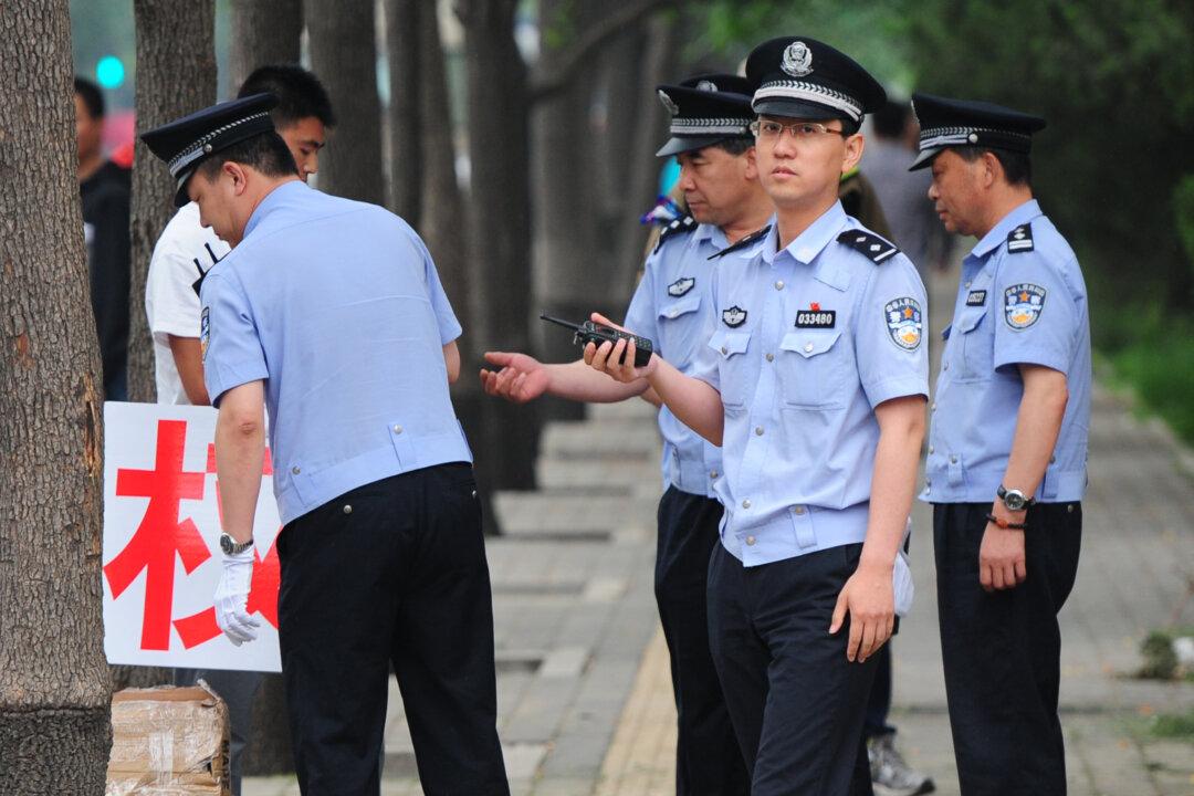 Beijing Resident: Police Framed and Tortured My Husband