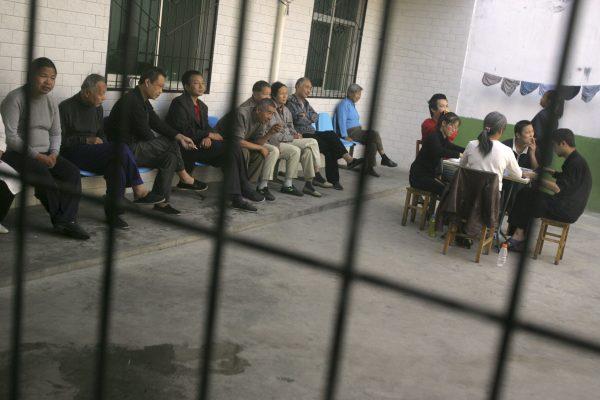 Patients are seen inside a psychiatric hospital in Xian in Shaanxi Province, China, on Oct. 8, 2006. Sane people have been forced into mental hospitals in China after complaining to authorities. (China Photos/Getty Images)