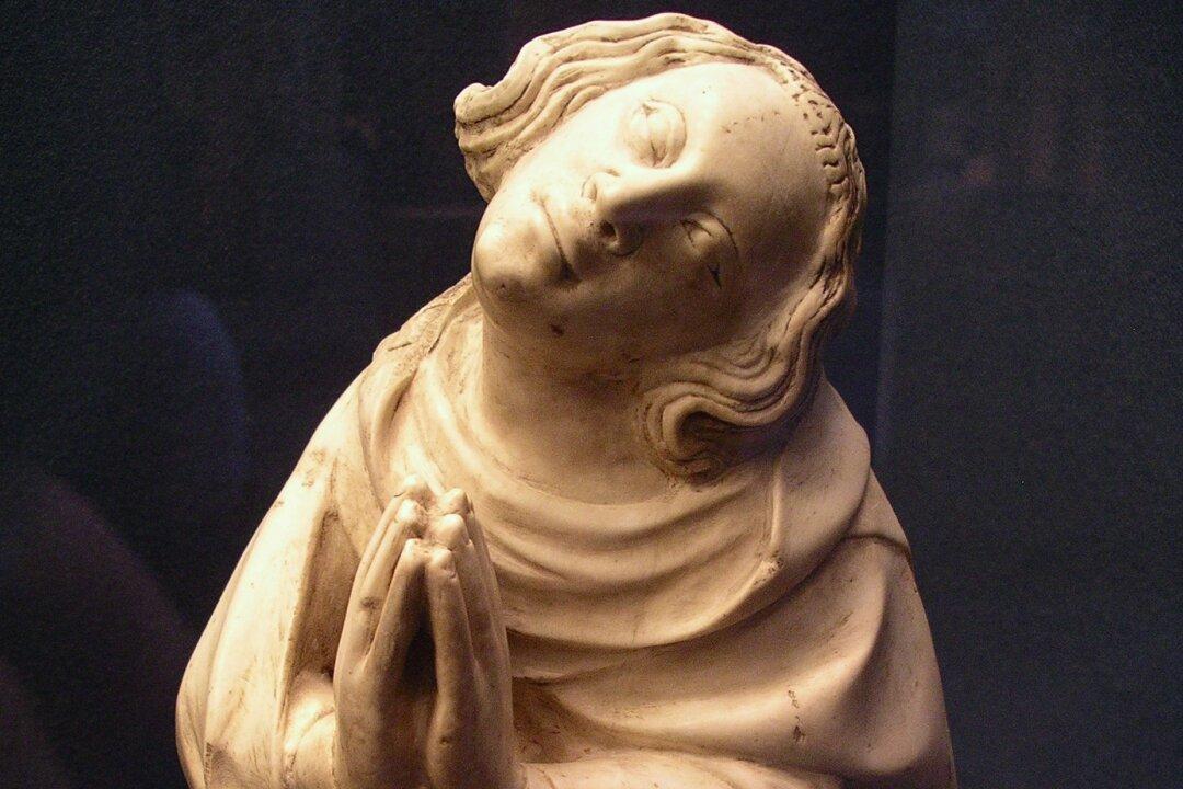 Sculpture of Saint Elzéar: Taking It on the Cheek