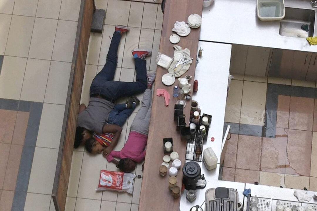 Pictures of Faith Wambua, ‘Brave Mother’ Hiding With Two Children in Westgate Mall, Inspire Kenyans
