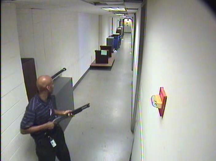 Aaron Alexis: Photos Released by FBI Show Navy Yard Shooter Enter Building, Armed with Shotgun (+Video)