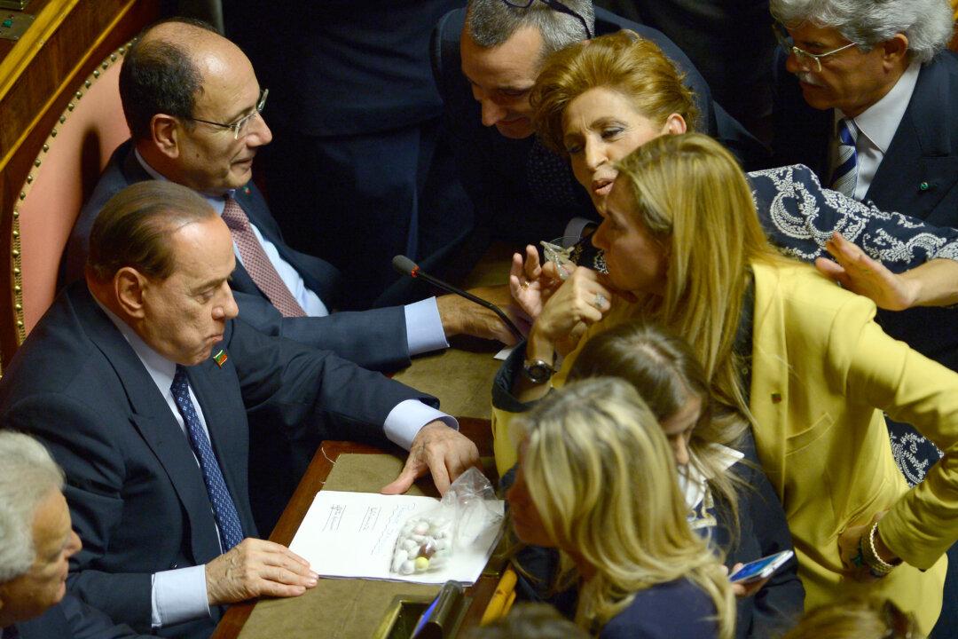 Political Exile in Sight for Berlusconi