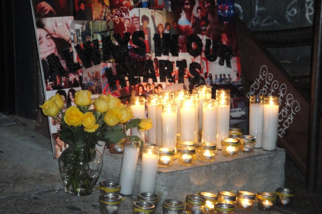 Candlelight Vigil Held for Slain Yellow Dogs Band Members