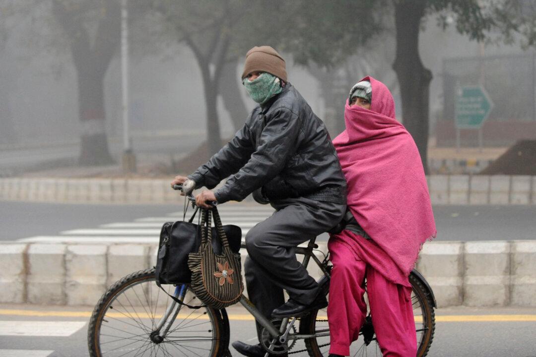 Delhi’s Old Buses as Poor People’s Winter Shelters