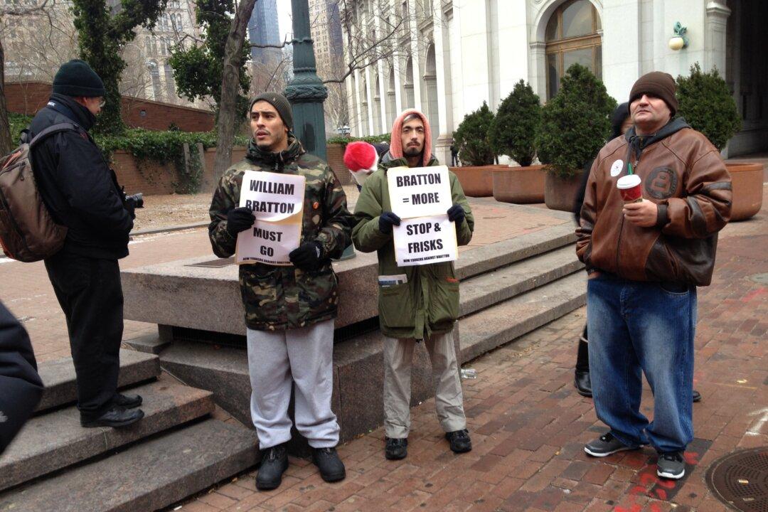 Protesters Oppose the Return of Bill Bratton