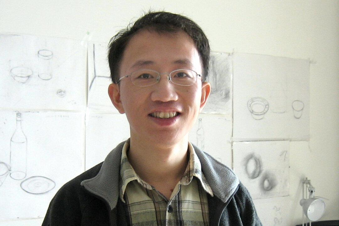 Another Chinese Rights Activist Sees Himself on Chopping Block