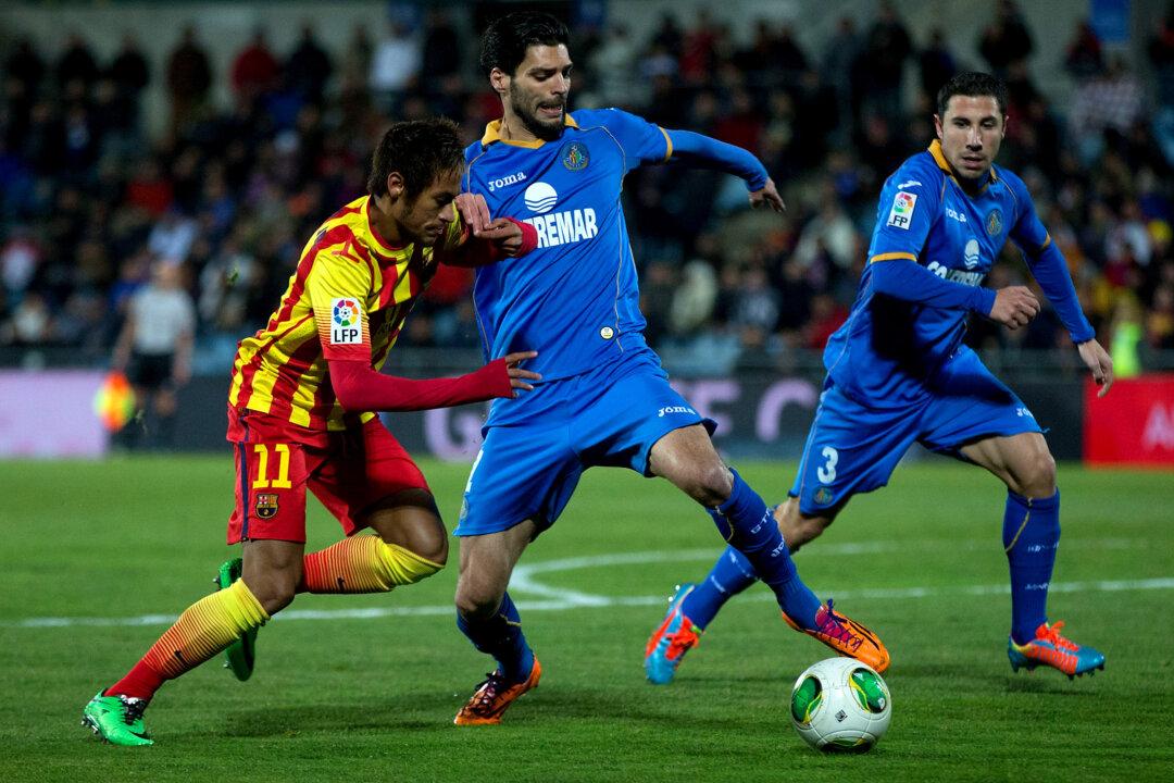 Hi-tech Turnstiles and Smart Boots Will Kick Sporting Giants Onto Internet of Things