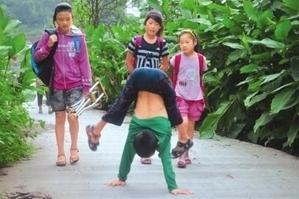 Paraplegic Boy Walking to School on his Hands Is Testament to the Indomitable Human Spirit