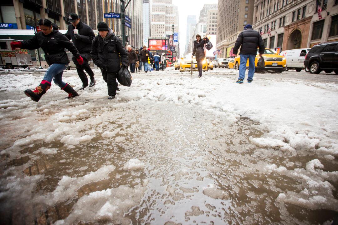 Slush in The City: New Yorkers Navigate After Lastest Dump (Photos)