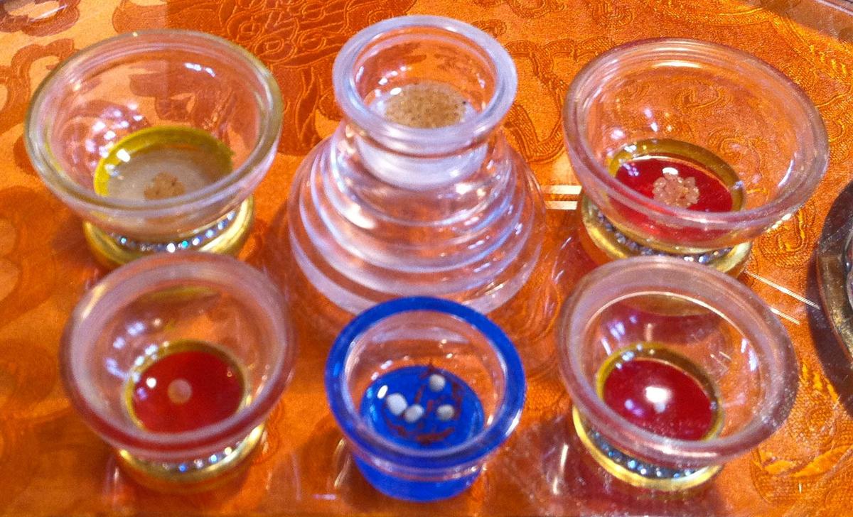 What Are the Pearl-Like Objects Found in Monks’ Ashes After Cremation?