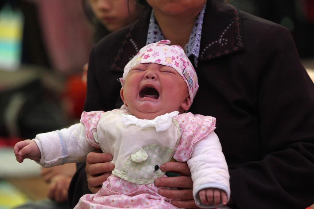 Poor Chinese Woman Arrested for Selling 3 of her Babies