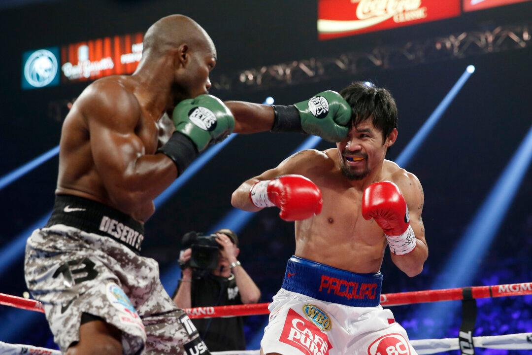Manny Pacquiao ‘Cheated In Rematch Fight Against Timothy Bradley With Plaster Hidden In His Gloves’ is Fake