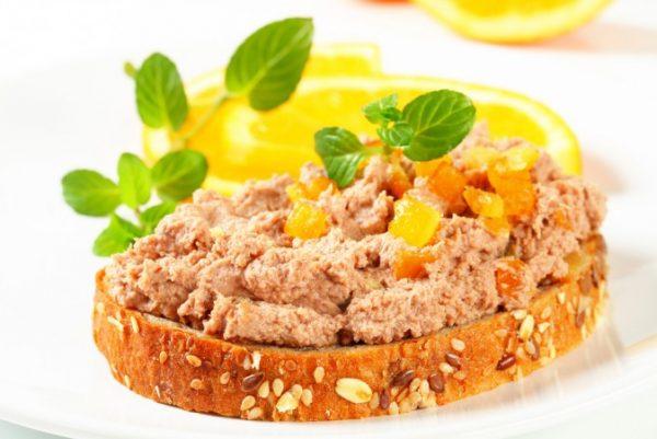 Whole grain bread with liver pate and some orange. (Shutterstock*)
