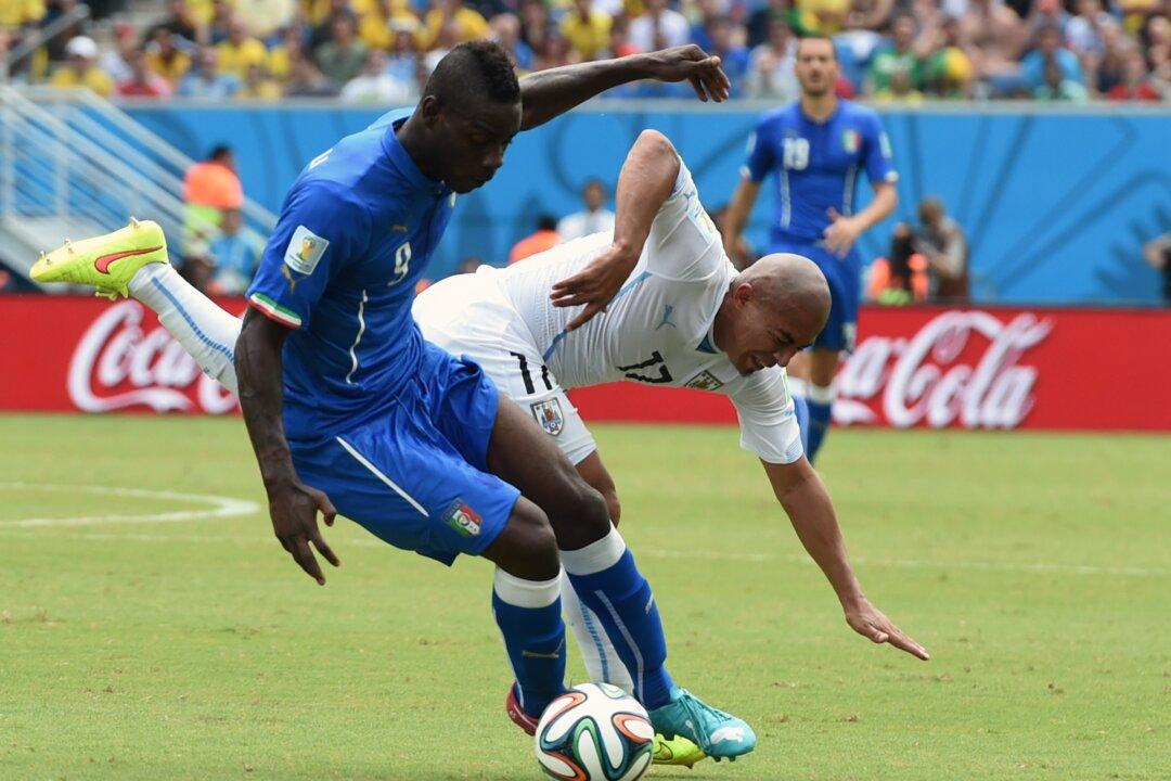 Mario Balotelli Yellow Card Video Today: Italy Striker Fouls Alvaro Pereira, Will Miss World Cup 2014 Round of 16 Game