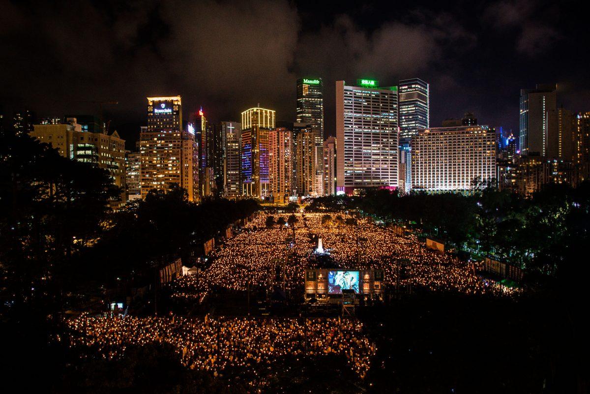 An estimated 180,000 people gather in Hong Kong's Victoria Park for a candlelight vigil memorializing the victims of the Tiananmen Square massacre and calling for the overthrow of the Chinese Communist Party on June 4, 2014. (Phillipe Lopez/AFP/Getty Images)