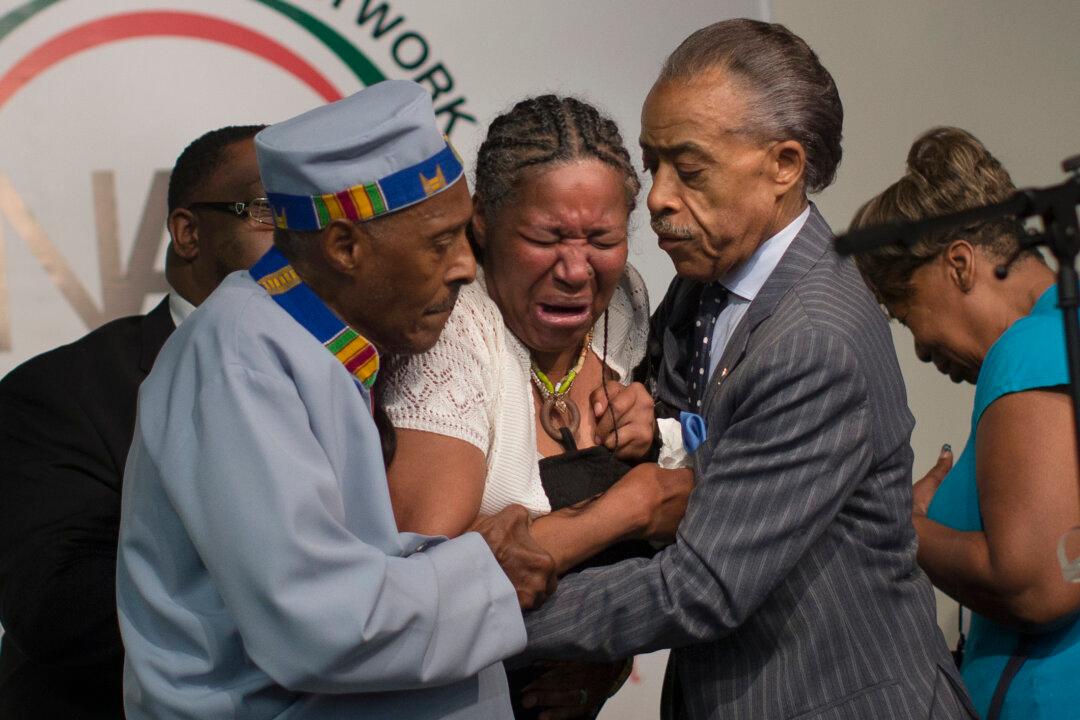 Grief and Outrage, After Black Man’s Police Chokehold Death