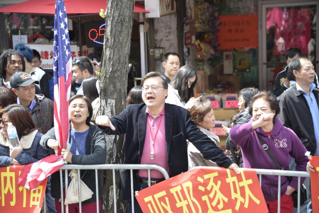 Flushing ‘Community Leader’ Serves Beijing