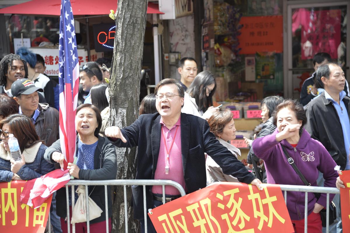 Flushing ‘Community Leader’ Serves Beijing