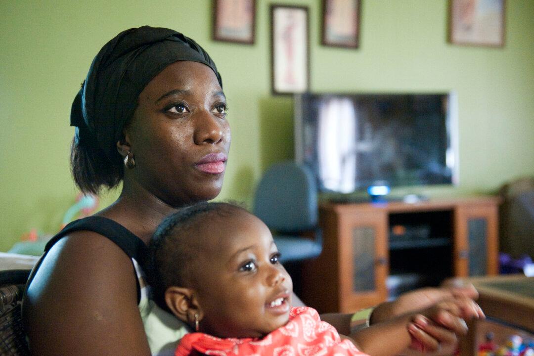 Patrick Sawyer, Ebola Victim, Traveled From Liberia to Nigeria for Healthcare: Widow Decontee Sawyer