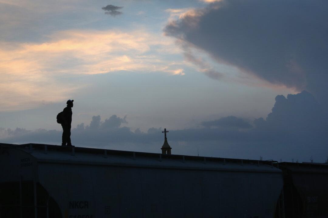 Young Migrant Faces Uncertain Future