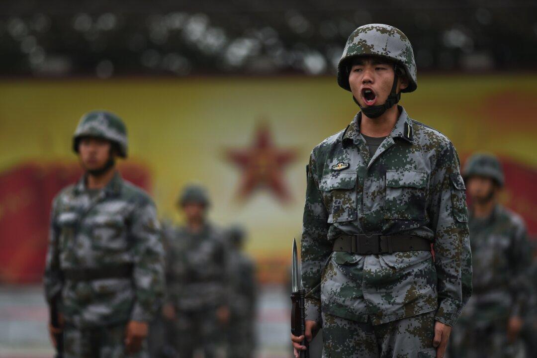 As Communist China Grows Weaker, It Puts On a Bigger Show of Force