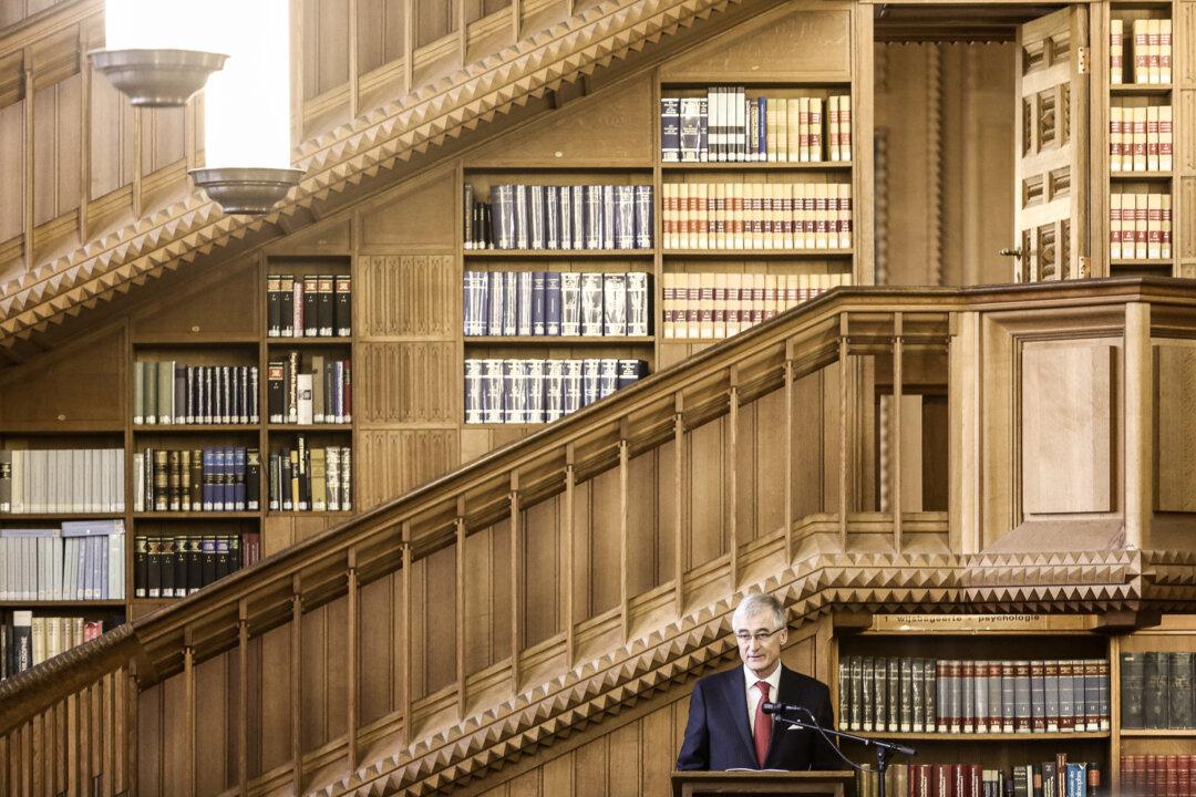 A Century After the Torching of the Louvain Library, What Have We Learned?