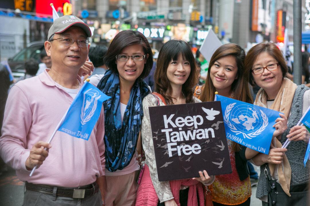 Old Pass Torch to Young as Rally Demands ‘Keep Taiwan Free’
