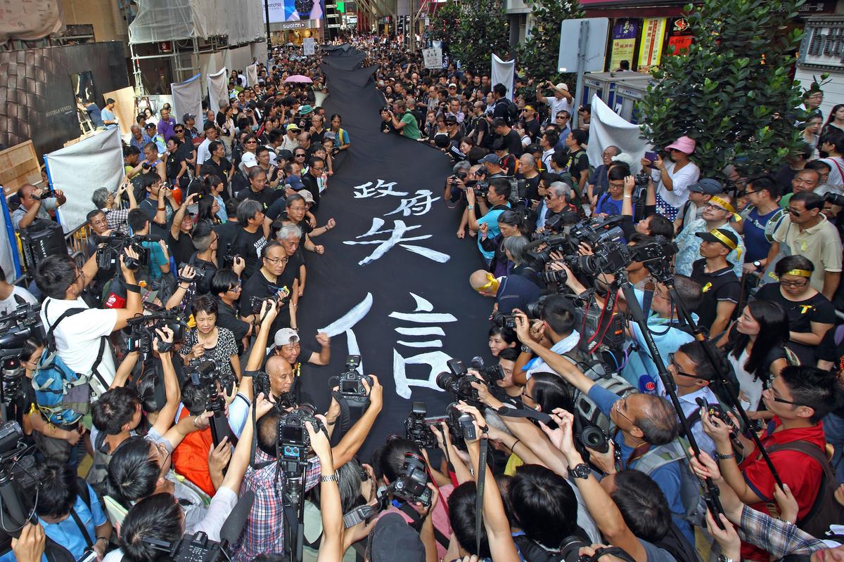 Black Means Indignation in Hong Kong, as Thousands Demand Universal Suffrage