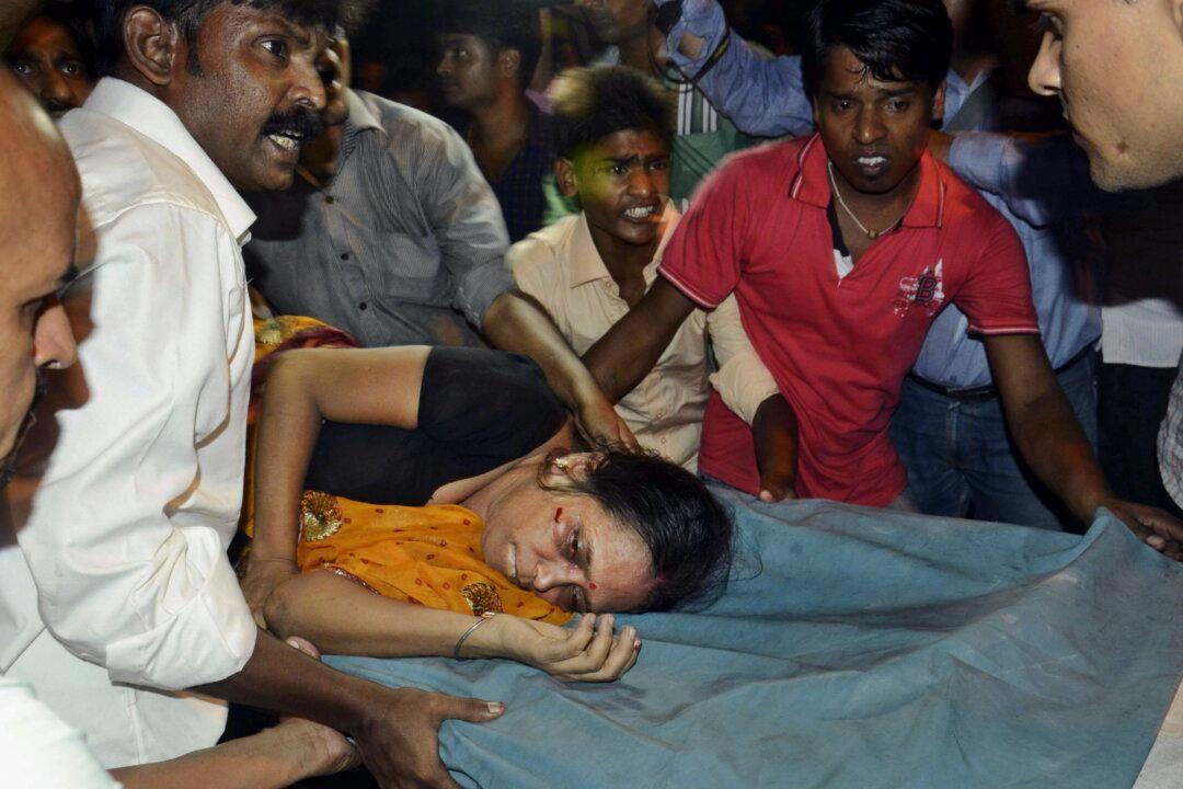 Stampede Kills 27 During Religious Bathing Festival in India