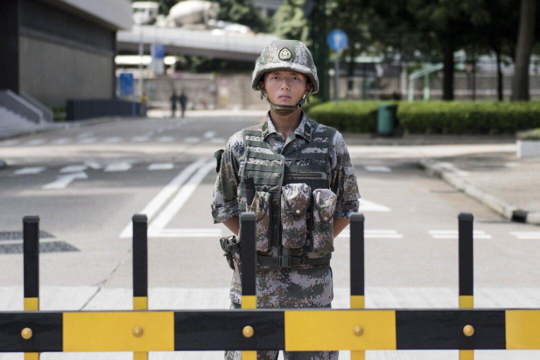 Beijing Meeting Considers Imposing Martial Law on Hong Kong