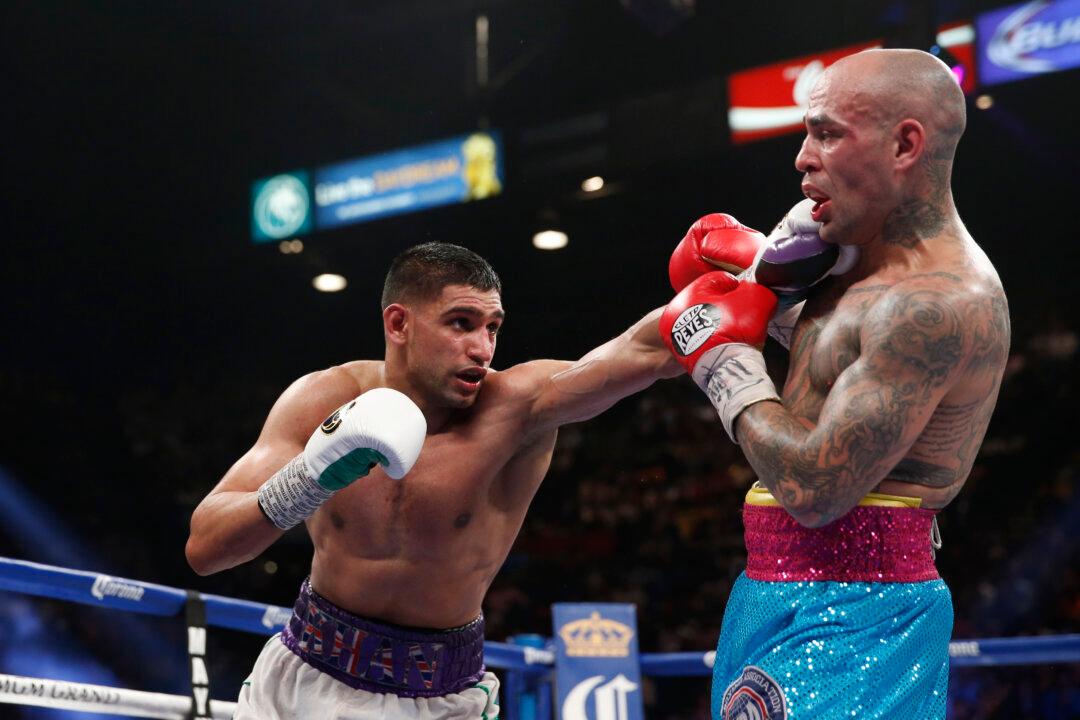 Amir Khan Next Fight: Winner of Khan-Alexander Will Likely Face Floyd Mayweather in 2015