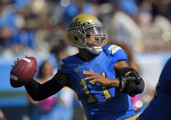 UCLA quarterback Brett Hundley passes the ball during the first half of a NCAA college football game against Oregon, Saturday, Oct. 11, 2014, in Pasadena, Calif. (AP Photo/Mark J. Terrill)