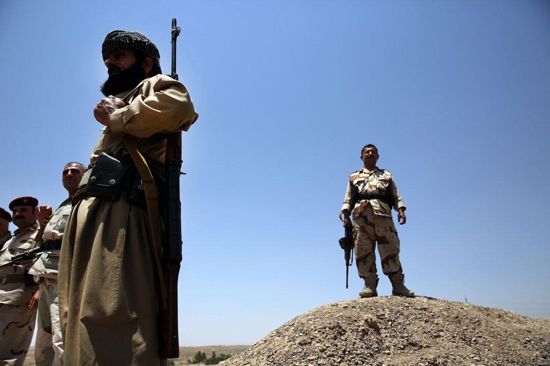 Worried Iraqi Capital Sees Militants Siege Take Shape