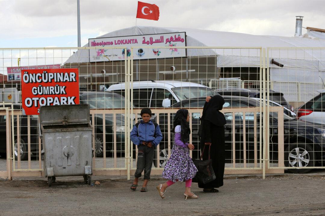Smugglers Offer $20 Passage From Turkey to Syria