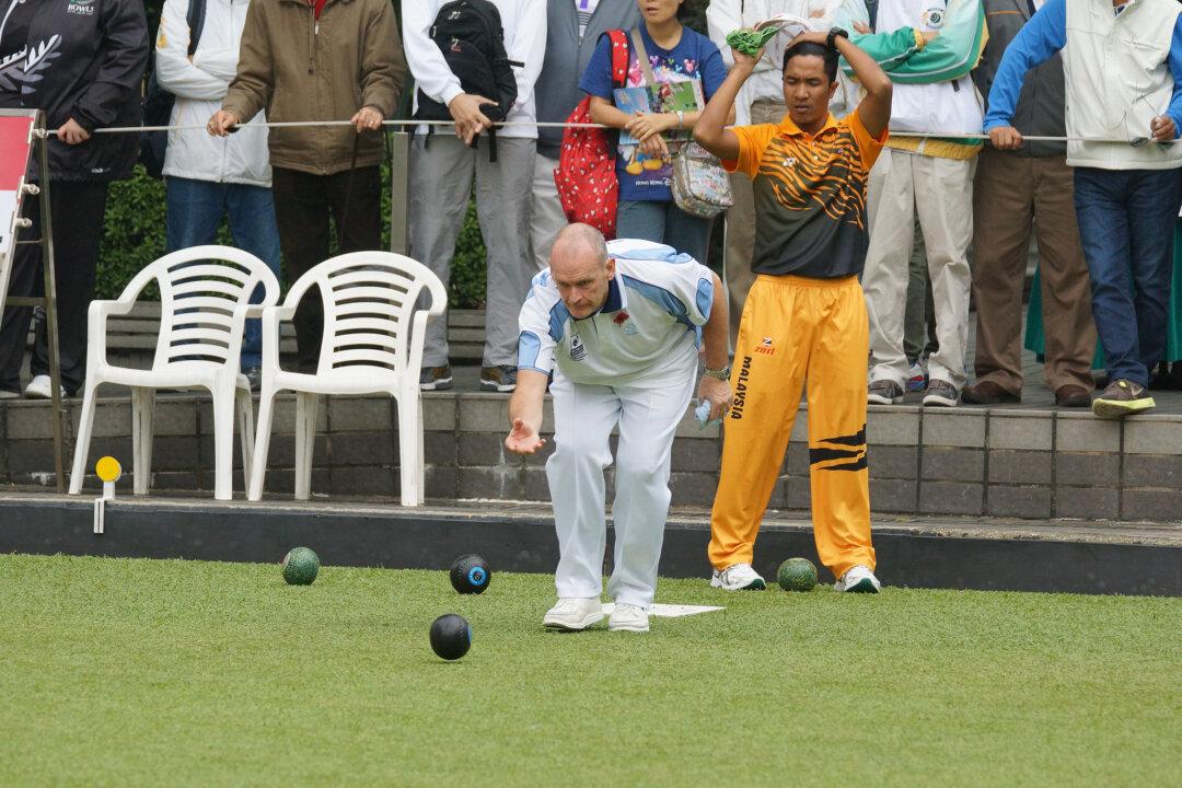 Defending Pairs Champion Wins Singles Title