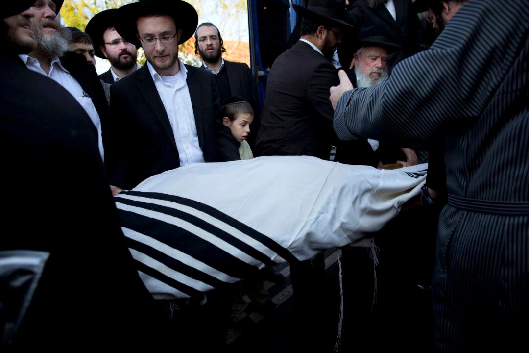 Israel Vows Harsh Response to Synagogue Attack