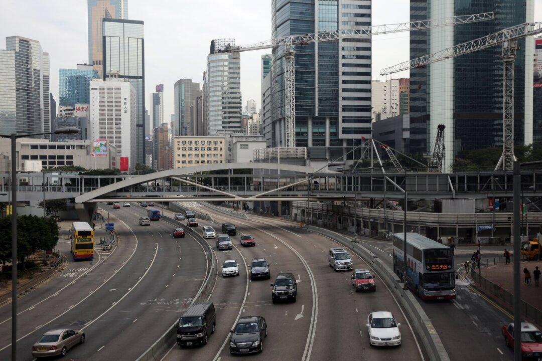 Umbrella Movement 75 Days Later: Traffic Resumes After Hong Kong Evicts Protesters