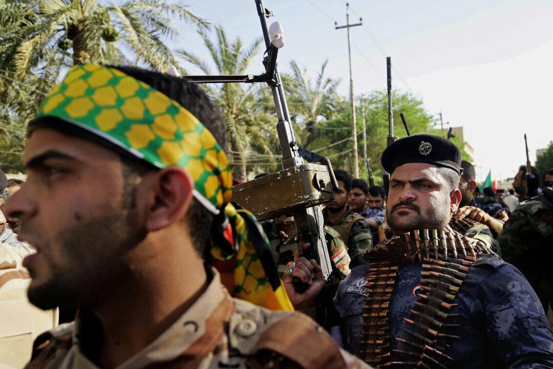 Iraq’s Shiite Fighters Desert Over Shortages