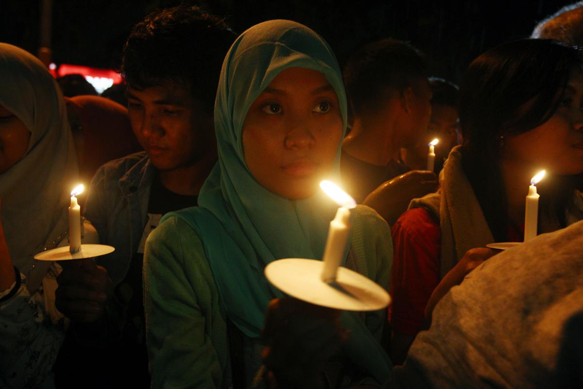 AirAsia Crash Update: Hayati Lutfiah Hamid ID'd as First Victim, Buried