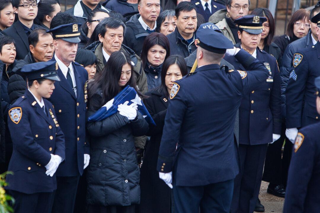 NYPD Officer Honored by Family, Praised by Comrades