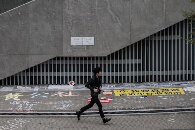 Young Hong Kong Protester Won’t Be Separated From Parents
