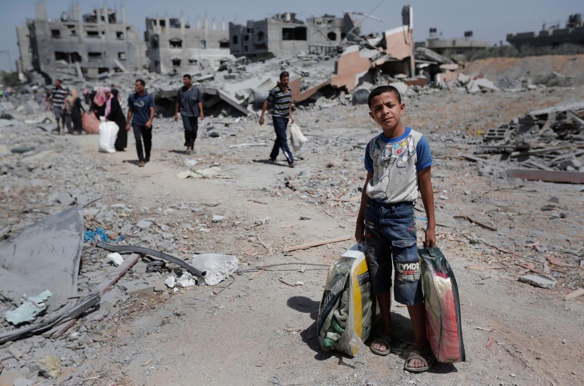 Official: Blast From Gaza War Ordnance Kills 4, Wounds 13