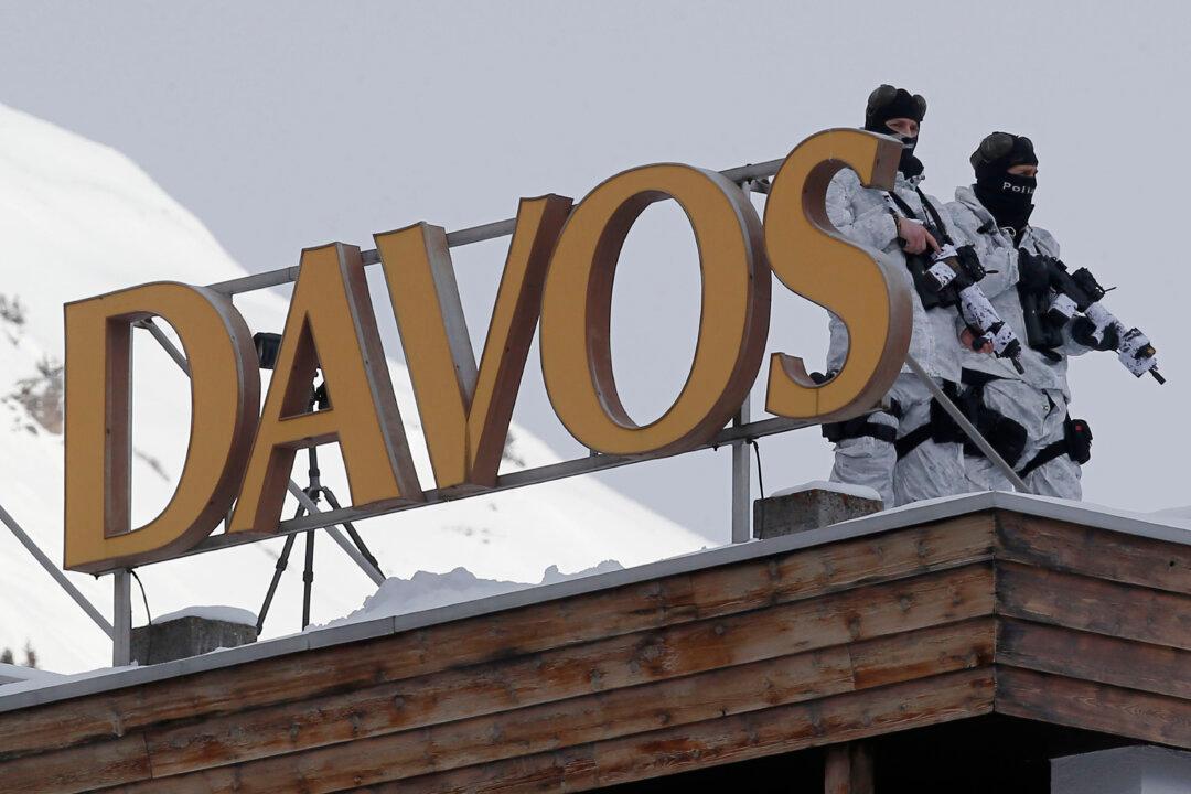 DAVOS WATCH: Anxiety Over Greece, Currency Wars, QE Support