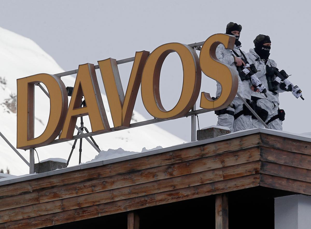 DAVOS WATCH: Anxiety Over Greece, Currency Wars, QE Support