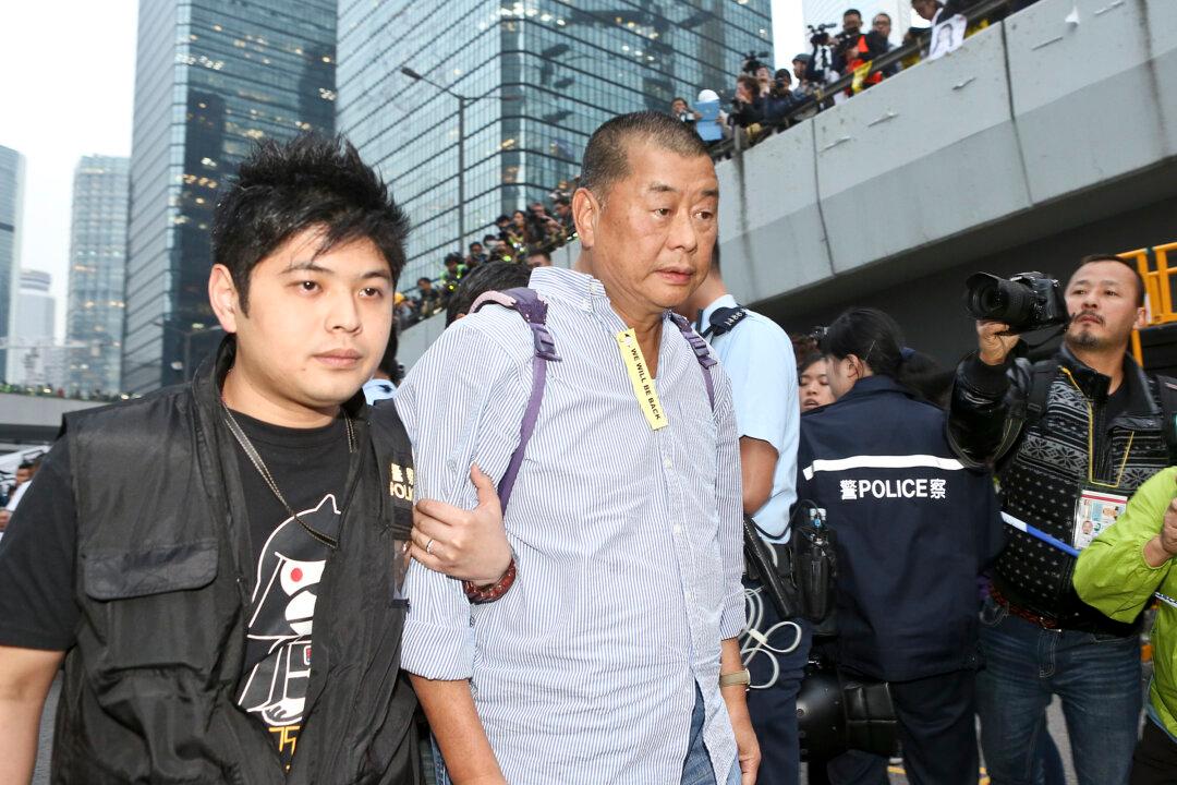 Violence Against Media in Hong Kong Is Seen as Tied to China