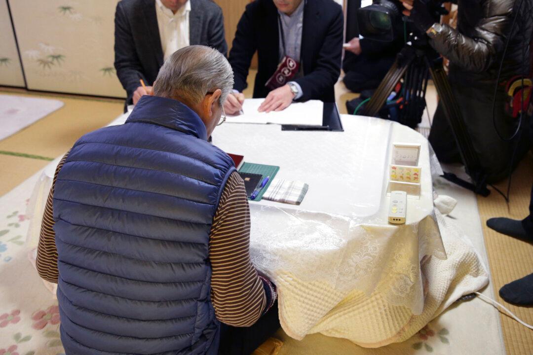 Father of Japanese Hostage Reported Killed Still Hopeful