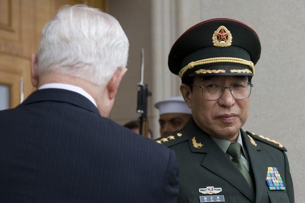 U.S. Secretary of Defense Robert Gates (L) greets the People's Republic of China Central Military Commission Vice Chairman General Xu Caihou (R) at the Pentagon in Washington, on Oct. 27, 2009. (Jim Watson/AFP/Getty Images)