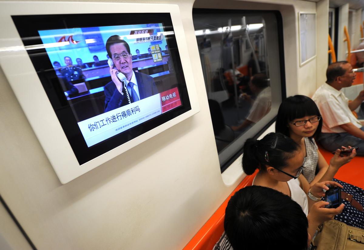 Chinese TV Anchor Rails Against State-Run Media