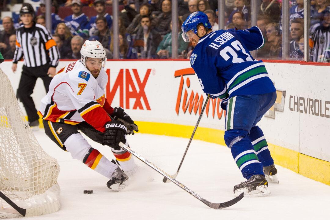Canucks Hold Slim Edge Over Flames
